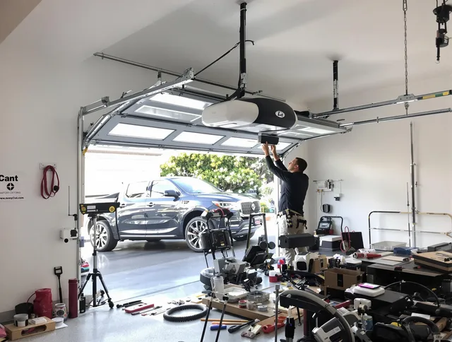 Dartmouth Garage Door Repair specialist installing smart garage door opener system in Dartmouth home