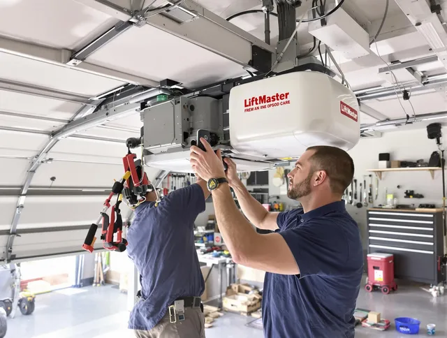 Dartmouth Garage Door Repair technician performing advanced diagnostics on garage opener in Dartmouth