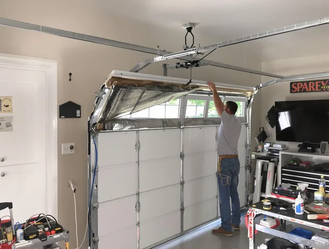Garage door section replacement by Dartmouth Garage Door Repair in Dartmouth