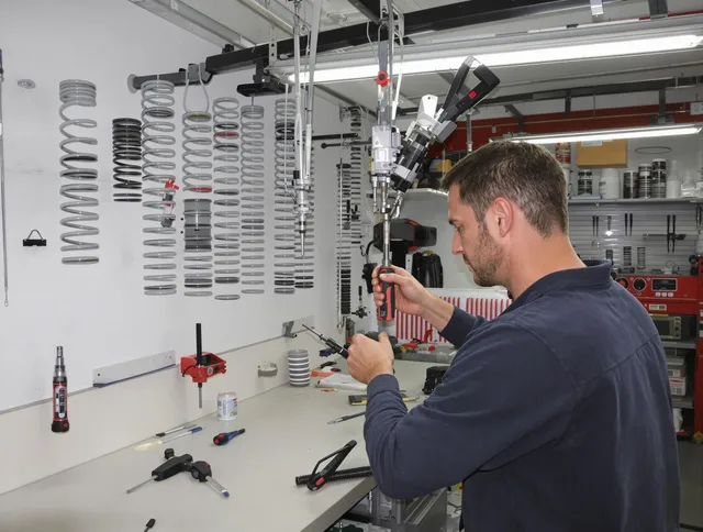 Dartmouth Garage Door Repair safety certified technician performing precision spring replacement in Dartmouth