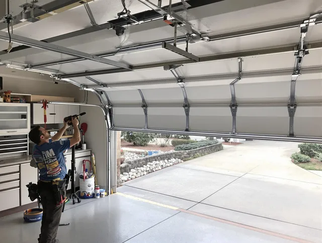 Garage door track repair service by Dartmouth Garage Door Repair in Dartmouth
